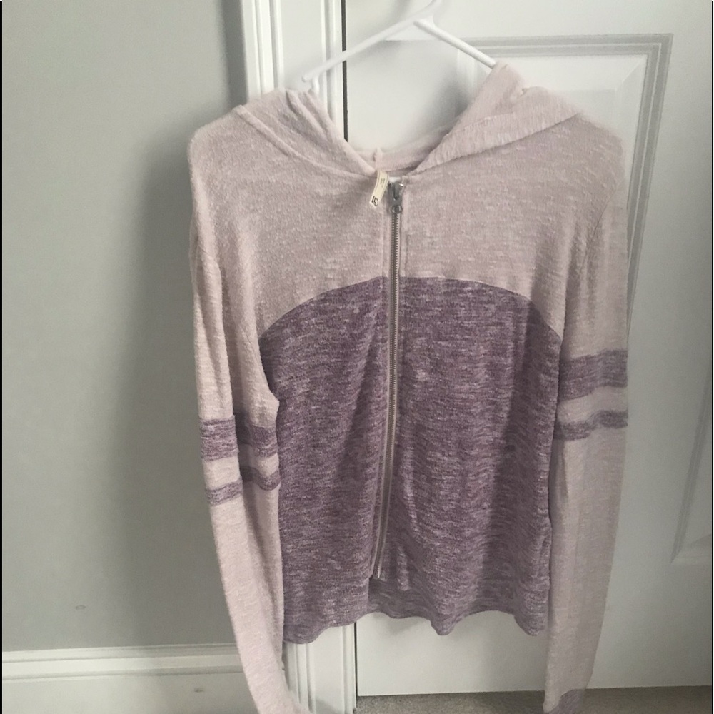 purple and cream colored zip up